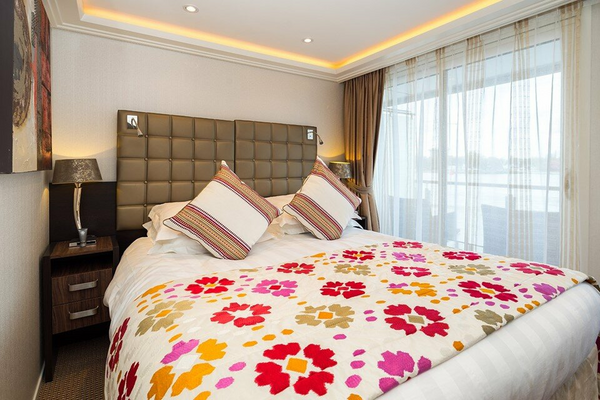 AmaWaterways AmaFiora Category BA Stateroom Bedroom WEB.png